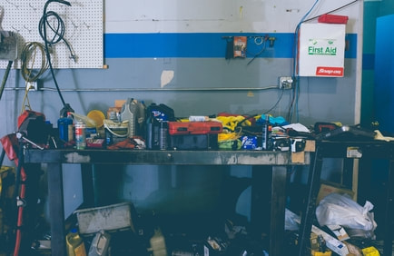 cluttered-garage-workbench-with-tools
